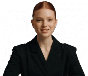 A woman with fair skin and red hair, wearing a black blazer, sits and smiles at the camera against a plain background, perfectly embodying the approachable professionalism of D-ID Agents.